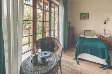 Фото номера Трехместный номер Курортные отели Łubinowe Wzgórze Eko Resort г. Наленчув 3