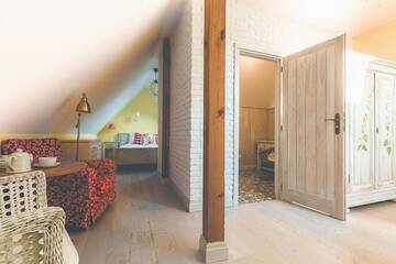 Фото номера Двухуровневые апартаменты Курортные отели Łubinowe Wzgórze Eko Resort г. Наленчув 4